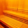 old man standing in the sauna