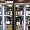 酒の店にて