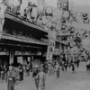 明治、大正、昭和初期の道頓堀の景観と、現在の道頓堀の景観。楽天地というレジャー施設があったなんて知らなかった。