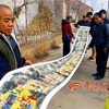 中国・陝西省　６８歳の男性、長さ２１メートルの「社火図」を描く