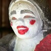 高牧の田の神、ペロっと舌を出す／鹿児島県姶良市蒲生町久末