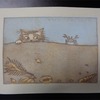 浜辺の猫とカニ