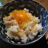 卵かけご飯に唐辛子をかけたった。ゴーヤの太り具合。