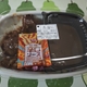 そびえる肉に食らいつくポークロックカレー