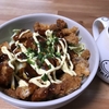 fried pork on the rice with cabbage souced with okonomiyaki sauce.