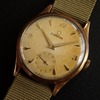 10. OMEGA cal.265 9ct. solid gold DENNISON case