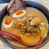 『麺場 田所商店』の“北海道味噌炙りチャーシューらーめん（1枚） トッピング味噌漬け玉子”