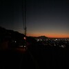 日没後のバックライトで浮き立つ皿倉山