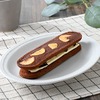 ファミリーマートから「チョコバナナクッキーサンド」が新登場！バナナチップをトッピングしたチョコスイーツ新商品です