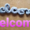 毛糸と針金を駆使して「welcome」という文字を作ってみた