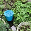 エアコン室外機からの水で水まき