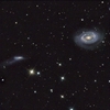 ＮＧＣ４７２５＋ＮＧＣ４７４７：かみのけ座の渦巻銀河