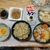 納豆玉子かけご飯。絹ごし男前豆腐。野菜味噌汁。大根ときゅうりの浅漬け。