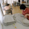 作業着を畳む、ブルーベリーのパック詰め、カタリナさん最終日