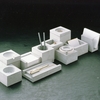 1986年、コンクリート製「机上用品」・1988年システムクリエイツ創立10周年記念品