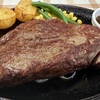 父の食べっぷりに感心する