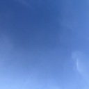 西の峰と春の空
