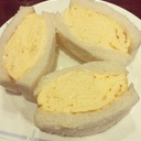 We are eating yellow sandwich