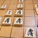 プロの棋士を育てま将