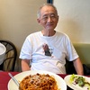 遠くから。