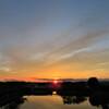雄大な夕景ー北播磨の地平線に沈む夕日とたなびく雲