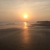 汗とビーチと沈む夕陽と