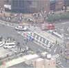 日中駅近く、大勢の人がいる中での銃撃