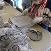 工業用ウェスを畳む、納品、ボランティアの出勤　