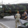 沖縄市知花で大型米軍車両が右折 !　直進の普通乗用車と衝突、普通乗用車の女性は軽傷、四時間半の渋滞を引き起こす