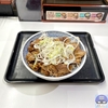 A review of a yakiniku bowl with large pieces of kalbi meat on top!