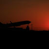 夕陽と飛行機。