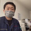 運送会社の事務所で積んでいく荷物の打ち合わせが