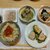 米粉の焼き物(レーズン)。イワシ水煮缶。ピーマン鶏肉詰め。