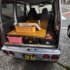 早朝便の配達が終わり、空の荷室の軽バンで自宅に