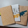 書店での買い物：ビニール袋とブックカバー、エコと利便性の狭間で