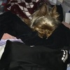 ココ、洗濯物の上で寝る