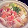 red fish cooked in a pot at the table　キンキ鍋