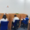 頑張る背中