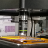 自動細胞イメージングシステム用の圧電対物レンズスキャナ